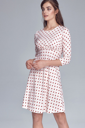 Retro společenské dámské šaty ke kolenům s neokoukaným puntíkovaným vzorem. tříčtvrteční rukáv kulatý