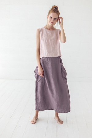 Originální lněná sukně v maxi délce a áčkovém střihu v zářivých barvách s velkými kapsami je jednoduchá a