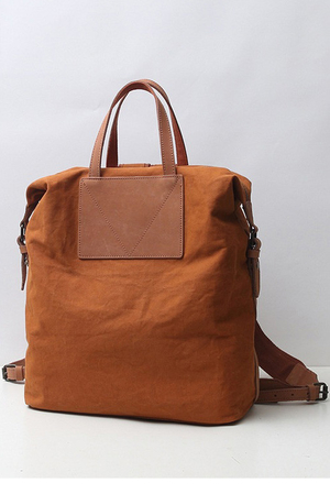 Jednoduchý batoh a taška v jednom z pevného plátna s koženými detaily s podšívkou dvě vnitřní volně přístupné