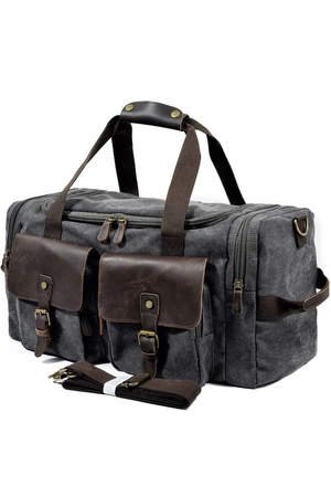 Prostorná cestovní taška s koženými detaily úložný prostor kompletně podšitý zapínání dvoucestným zipem